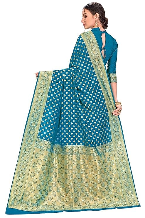 Woman wearing a teal party wear ethnic kurta style by Nishtha Chadda