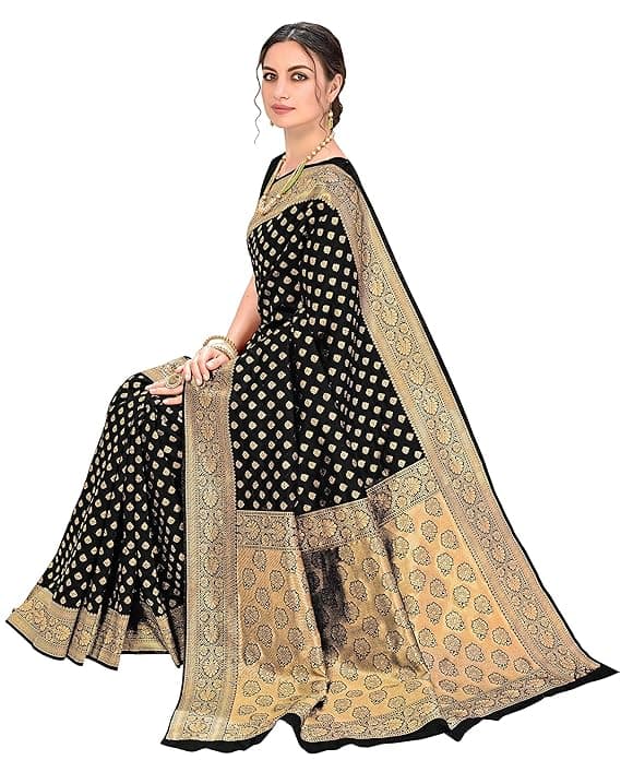 Woman wearing a beige party wear ethnic kurta style by Nishtha Chadda