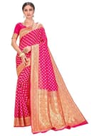 Woman wearing a red party wear ethnic kurta style by Nishtha Chadda