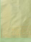 Woman wearing a beige indian kurti for women by Nishtha Chadda