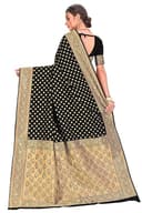 Woman wearing a beige indian kurti for women by Nishtha Chadda