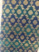 Woman wearing a navy embroidered kurti set by Nishtha Chadda