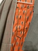 Woman wearing a brown embroidered kurti set by Nishtha Chadda