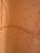 Woman wearing a brown embroidered kurti set by Nishtha Chadda