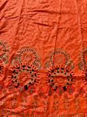 Woman wearing a maroon embroidered kurti set by Nishtha Chadda