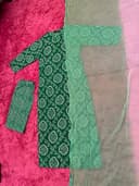 Woman wearing a maroon embroidered kurti set by Nishtha Chadda