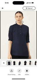 Woman wearing a maroon embroidered kurti set by Nishtha Chadda