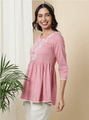 Woman wearing a grey indian kurti for women by Nishtha Chadda