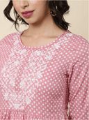 Woman wearing a grey indian kurti for women by Nishtha Chadda