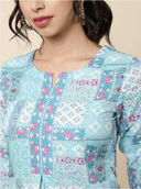 Woman wearing a olive indian kurti for women by Nishtha Chadda