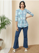 Woman wearing a olive indian kurti for women by Nishtha Chadda