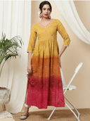 Woman wearing a red indian kurti for women by Nishtha Chadda