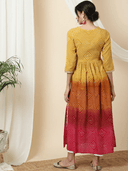 Woman wearing a red indian kurti for women by Nishtha Chadda
