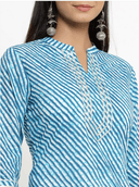 Woman wearing a grey indian kurti for women by Nishtha Chadda