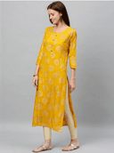 Woman wearing a grey indian kurti for women by Nishtha Chadda