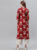 Woman wearing a red indian kurti for women by Nishtha Chadda
