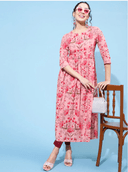 Woman wearing a red indian kurti for women by Nishtha Chadda