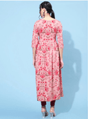 Woman wearing a red indian kurti for women by Nishtha Chadda