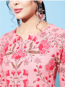 Woman wearing a red indian kurti for women by Nishtha Chadda