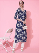 Woman wearing a red indian kurti for women by Nishtha Chadda