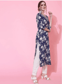 Woman wearing a red indian kurti for women by Nishtha Chadda