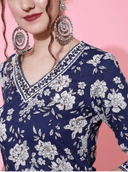 Woman wearing a red indian kurti for women by Nishtha Chadda