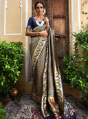 Woman wearing a black indian kurti for women by Nishtha Chadda