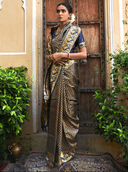 Woman wearing a black indian kurti for women by Nishtha Chadda