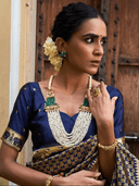 Woman wearing a black indian kurti for women by Nishtha Chadda
