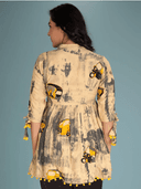 Woman wearing a grey indian kurti for women by Nishtha Chadda