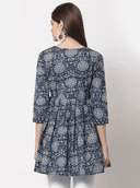Woman wearing a grey indian kurti for women by Nishtha Chadda