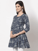 Woman wearing a grey indian kurti for women by Nishtha Chadda