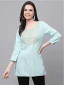 Woman wearing a grey indian kurti for women by Nishtha Chadda