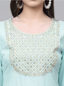 Woman wearing a grey indian kurti for women by Nishtha Chadda
