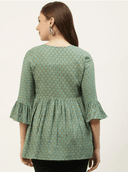 Woman wearing a olive indian kurti for women by Nishtha Chadda