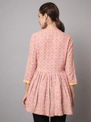 Woman wearing a grey indian kurti for women by Nishtha Chadda