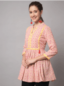 Woman wearing a grey indian kurti for women by Nishtha Chadda