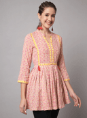 Woman wearing a grey indian kurti for women by Nishtha Chadda