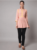 Woman wearing a grey indian kurti for women by Nishtha Chadda
