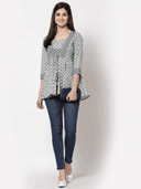 Woman wearing a grey indian kurti for women by Nishtha Chadda