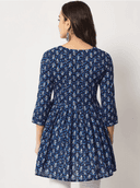 Woman wearing a navy indian kurti for women by Nishtha Chadda