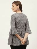 Woman wearing a navy indian kurti for women by Nishtha Chadda