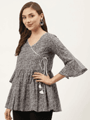 Woman wearing a navy indian kurti for women by Nishtha Chadda