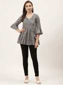 Woman wearing a navy indian kurti for women by Nishtha Chadda