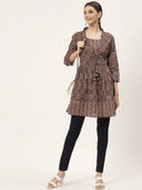 Woman wearing a navy indian kurti for women by Nishtha Chadda