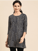 Woman wearing a grey indian kurti for women by Nishtha Chadda