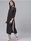 Woman wearing a grey indian kurti for women by Nishtha Chadda