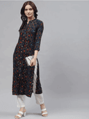 Woman wearing a grey indian kurti for women by Nishtha Chadda