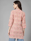 Woman wearing a grey indian kurti for women by Nishtha Chadda