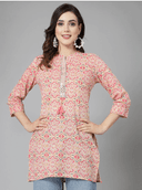 Woman wearing a grey indian kurti for women by Nishtha Chadda